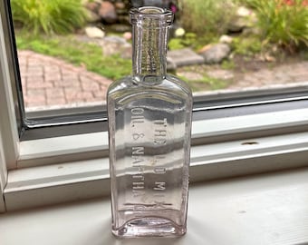 Late 1800’s Amethyst Manganese L.D. Mix Oil & Naphtha Co. cork top Medicine bottle, Cleveland, no large chips or cracks, antique apothecary