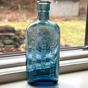 1800s Woodward Chemist Nottingham Cornflower blue bottle, no chips or cracks