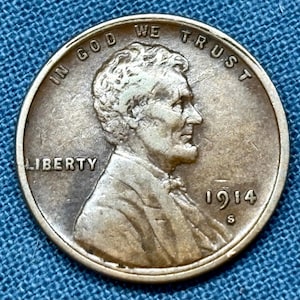 1914-S Wheat Penny XF condition, cheek, hair & jaw bone fairly strong with clean wheat lines