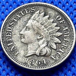 1864 Indian Head penny in F condition, nearly full Liberty legible, rare date copper coin C2