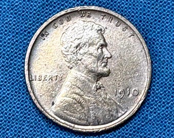 1910 Lincoln Wheat Penny in AU condition, strong cheek/jawbone separation, hair and wheat lines