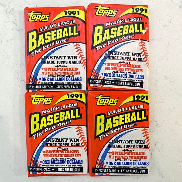 1991 Topps (4) unopened baseball card packs, Ken Griffey Jr., Frank Thomas, Chipper Jones RC
