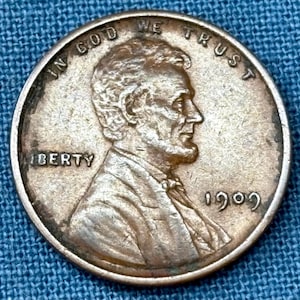 1909 Wheat Penny in XF-AU Condition, clean wheat ridges, cheekbone and hair curls sharp