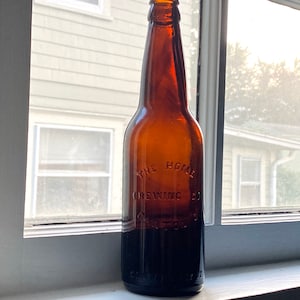 Early 1900’s 2-Part Seam Home Brewing Company 12oz beer bottle in perfect condition no chips or cracks