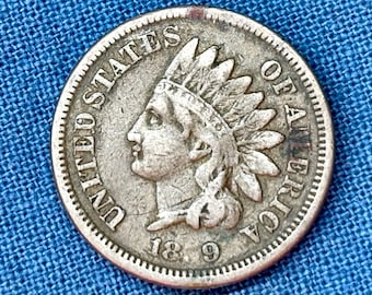 1859 Indian Head penny in F+ condition, Liberty near complete, rare date copper coin