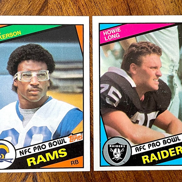 1984 Eric Dickerson & Howie Long RC’s Topps Football, sharp corners, no creases