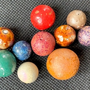 Late 1800s-Early 1900s clay marble lot (10), 2 Bennington’s and 1 large clay marble, lot A