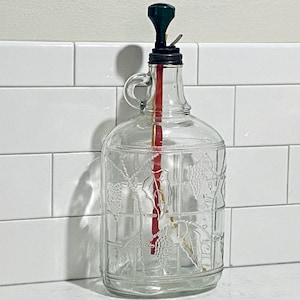 Mid 1900’s Embossed Half Gallon winemaker’s bottle in perfect condition, no chips or cracks
