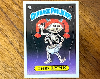 1985 Garbage Pail Kids Series 1 Card #11b, Bugged Bert, Sharp