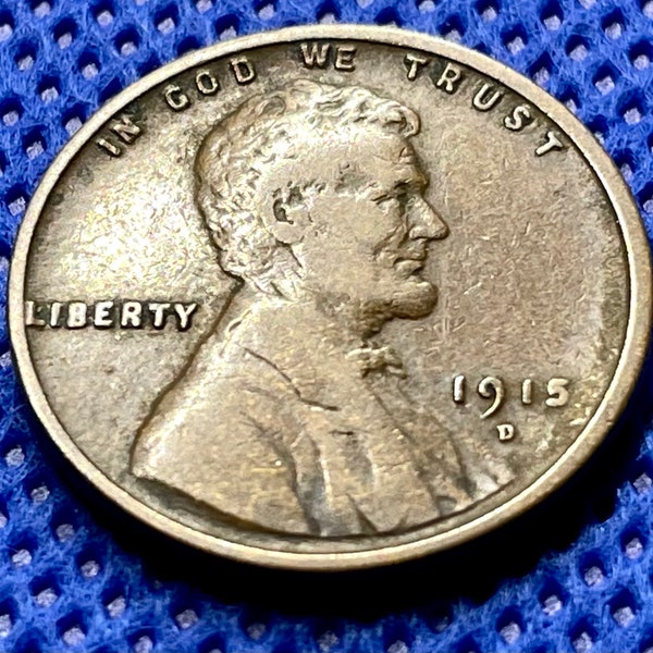 1915-D Wheat Penny in F+ condition, wheat stalks nearly full