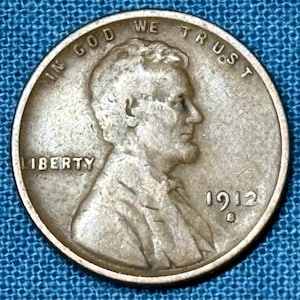 1912-S Wheat Penny in VF+ condition, mild cheek & jaw bone with clean wheat lines
