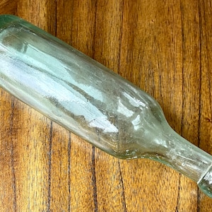 1800’s Antique round bottom green glass soda bottle, no chips or cracks