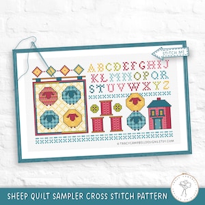 May include: A framed cross-stitch pattern featuring a sheep quilt sampler design. The pattern includes colorful sheep, an alphabet, spools of thread, and a house. The text "STITCH ME" is on a small arrow. The words "SHEEP QUILT SAMPLER CROSS STITCH PATTERN" are at the bottom.