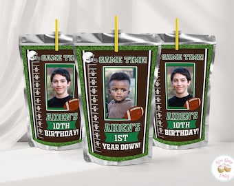 May include: Three silver foil drink pouches with yellow straws, featuring a football theme. The labels display a yard line graphic, a football, a helmet, and the text GAME TIME, AIDEN'S 10TH BIRTHDAY, or AIDEN'S 1ST YEAR DOWN, with a photo of a child.