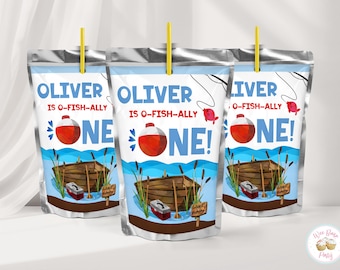 May include: Three silver drink pouches with yellow straws, each featuring a fishing-themed graphic with a wooden boat, a red and white bobber, and the text OLIVER IS O-FISH-ALLY ONE! in blue and red lettering against a light blue background.
