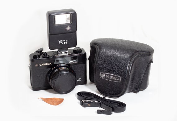 Yashica Electro 35 Gx Black 35mm Vintage Rangefinder Camera Etsy Yashica Electro 35 Gx Black 35mm Vintage Rangefinder Camera Etsy