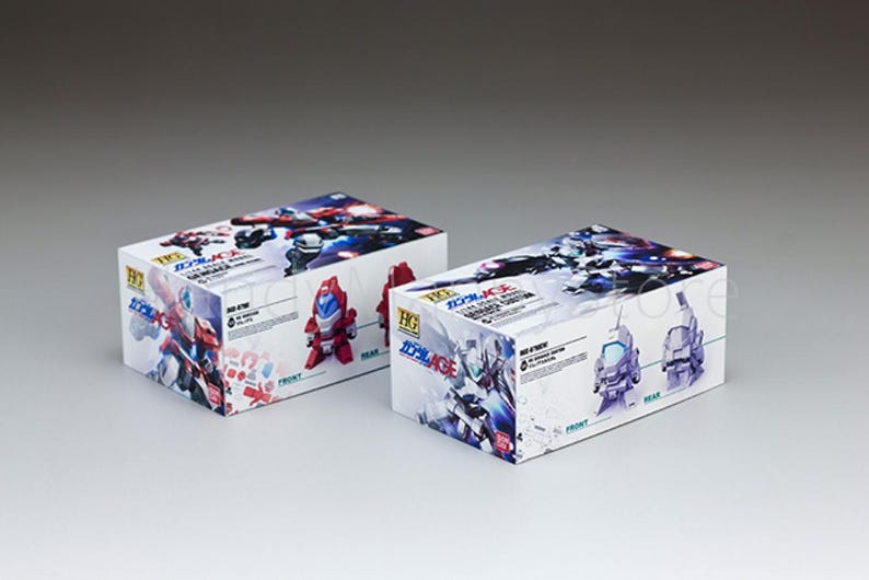 May include: Two white boxes with colorful illustrations of robots and Japanese text. The boxes have images of red, blue, and purple robots. The boxes are labeled "HG" and "Gundam AGE".