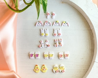 Easter /Spring Polymer Clay studs . Bunny Head, floral rabbit Cross , chicken, Easter egg . Pastel pink , violet, yellow. Hypoallergenic.