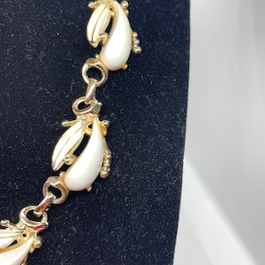 White Thermoset with Enamel Leaves and Gold Tone Necklace from the 1960’s