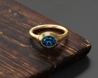 Gold Topaz Ring: London Blue Oval Gemstone, Bezel Set