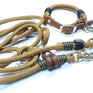 Puede incluir: Un conjunto de accesorios para perros en marr&oacute;n, dorado y verde. El conjunto incluye un collar de cuerda, una correa de cuerda con un mango de cuero y una correa de cuerda a juego con un clip de metal. Las correas tienen aproximadamente 1,5 metros de largo.