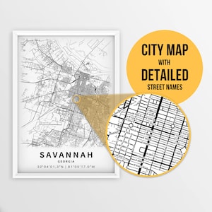 May include: A black and white city map of Savannah, Georgia with detailed street names. The map shows the city's layout with streets, avenues, and landmarks. The map is framed in a white frame.