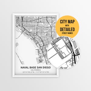 May include: A framed black and white city map of Naval Base San Diego, California, with detailed street names. A circular inset highlights a section of the map. The text "CITY MAP WITH DETAILED STREET NAMES" is in a yellow circle.