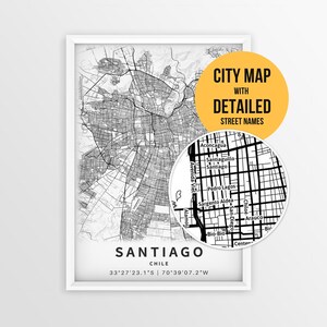 May include: A framed black and white map print of Santiago, Chile, featuring a detailed street grid. A circular inset shows zoomed-in street names. Text reads: CITY MAP WITH DETAILED STREET NAMES, SANTIAGO, CHILE, 33°27'23.1"S | 70°39'07.2"W.