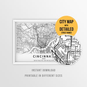 Puede incluir: Un mapa impreso en blanco y negro de Cincinnati, Ohio, con un recuadro circular que muestra nombres de calles detallados como Vine St, Gage St y Auburn Ave. El texto dice CINCINNATI OHIO 39 07 46.5 N 84 30 23.5 W y CITY MAP WITH DETAILED STREET NAMES.