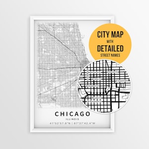 May include: A framed black and white map print of Chicago, Illinois, featuring a grid of streets and coordinates. A circular inset shows a magnified view of street names like W Huron St and W Lake St. A yellow circle contains the text CITY MAP WITH DETAILED STREET NAMES.