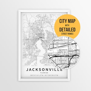 May include: A framed black and white map of Jacksonville, Florida, featuring a circular inset showing detailed street names. The text reads CITY MAP WITH DETAILED STREET NAMES, JACKSONVILLE, FLORIDA, and the coordinates 30°21'41.2"N | 81°39'36.5"W.