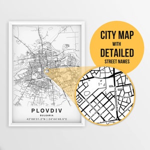 May include: A black and white city map of Plovdiv, Bulgaria with detailed street names. The map is framed in a white frame and is set against a white background. The map is highlighted with a yellow circle around the city center.
