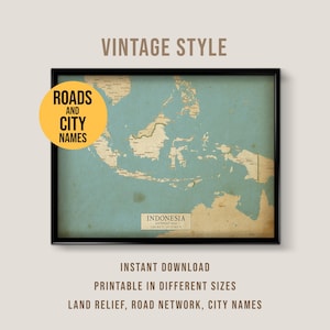 May include: Vintage-style map of Indonesia with a teal and tan color scheme, framed in black. The map includes land relief, road networks, and city names. Text on the map includes "ROADS AND CITY NAMES" and "INDONESIA".