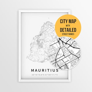 May include: A framed wall art print featuring a black and white map of Mauritius with detailed street lines. The text reads MAURITIUS, 20°10'10.6"S 57°30'17.7"E, and a yellow circular overlay states CITY MAP WITH DETAILED STREET NAMES.