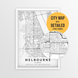 May include: A framed black and white map print of Melbourne, Florida, featuring a circular inset showing detailed street names. The text reads CITY MAP WITH DETAILED STREET NAMES, MELBOURNE FLORIDA, and the coordinates 28°07'21.7"N | 80°38'49.6"W.