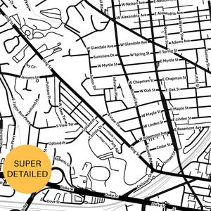 May include: A black and white map with street names and a yellow circle that says "SUPER DETAILED". The map shows a detailed layout of streets, roads, and intersections.