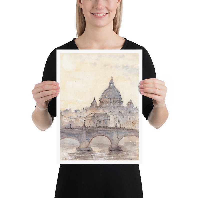 Peut inclure: Une peinture &agrave; l'aquarelle de la basilique Saint-Pierre de Rome, en Italie. La peinture repr&eacute;sente le d&ocirc;me et la fa&ccedil;ade de la basilique, ainsi qu'un pont au premier plan.