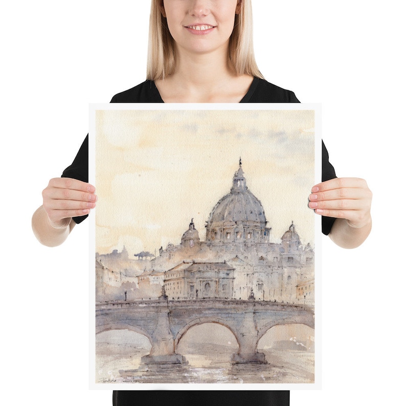 Peut inclure: Une peinture &agrave; l'aquarelle de la basilique Saint-Pierre de Rome, en Italie. La peinture repr&eacute;sente le d&ocirc;me de la basilique, le pont devant elle et l'horizon de la ville en arri&egrave;re-plan. La peinture est r&eacute;alis&eacute;e dans des tons de gris, de bleu et de blanc.