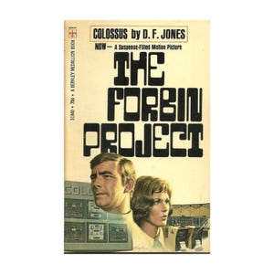 May include: Vintage paperback book cover for "The Forbin Project" by D.F. Jones. The cover features a man and woman, with the title in bold, black letters. The book is a Berkley Medallion Book.