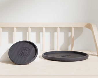 Coasters in matt black made of bioplastic in various sizes / also suitable for cups