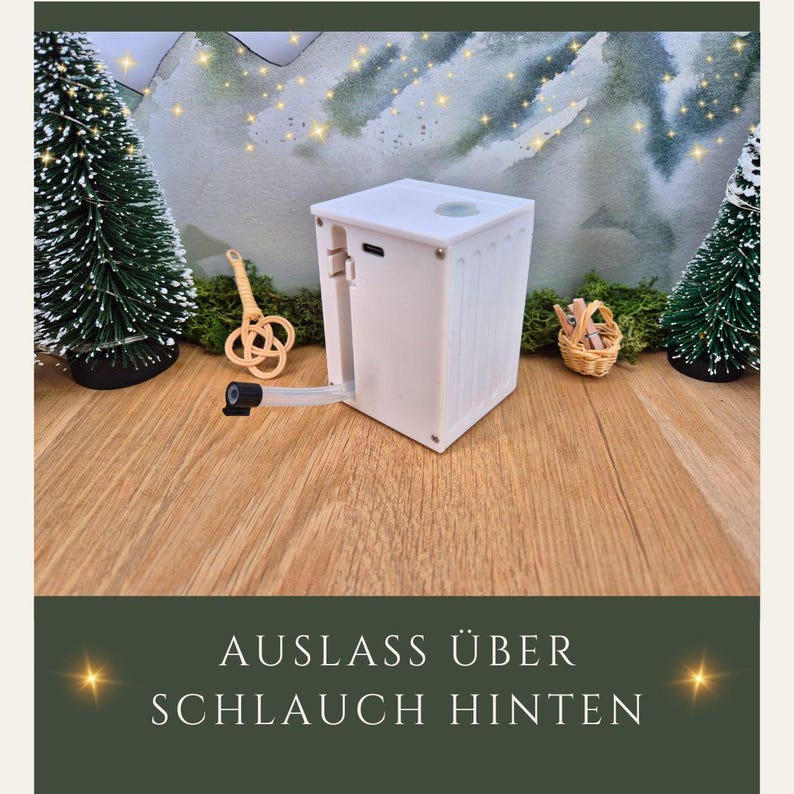 May include: A white, rectangular device with a spout and a small, round opening on top. The device has a ridged side and is positioned on a wooden surface. The text "AUSLASS &Uuml;BER SCHLAUCH HINTEN" is at the bottom of the image.