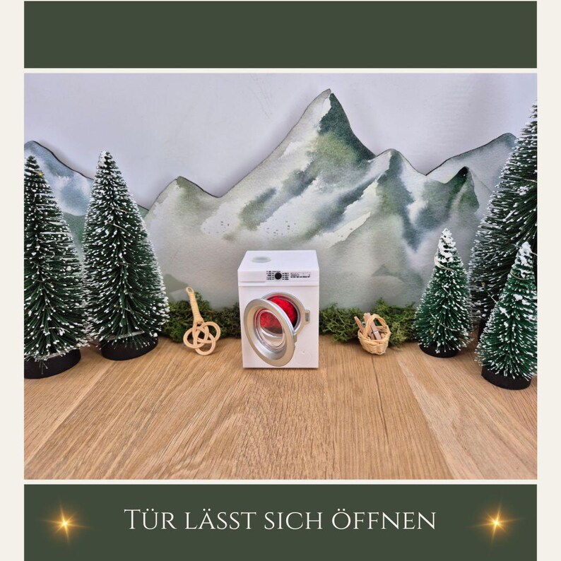 May include: A miniature white washing machine with an open red door is the focal point, surrounded by small green Christmas trees and a mountain backdrop. The text "T&Uuml;R L&Auml;SST SICH &Ouml;FFNEN" is at the bottom.