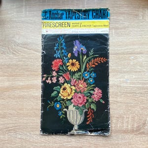 May include: A vintage tapestry chart for a firescreen featuring a colorful floral arrangement in a vase. The chart is titled "Anchor Tapestry Chart" and is worked in Coats Anchor Tapisserie Wool. The chart number is 961 and the price is 2.