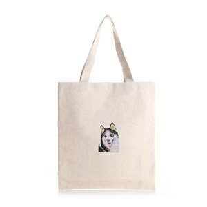 May include: A white canvas tote bag with a black and white embroidered image of a husky dog.
