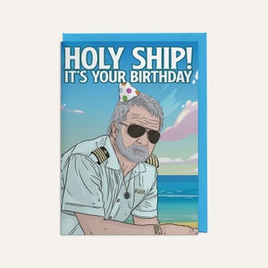 May include: A birthday card featuring a cartoon illustration of a man wearing a captain's uniform and a party hat. The text on the card reads "HOLY SHIP! IT'S YOUR BIRTHDAY!"