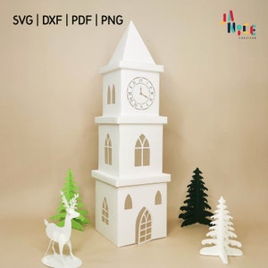 May include: A white, three-tiered clock tower with a pointed roof, featuring a clock face with Roman numerals. The image includes the text "SVG | DXF | PDF | PNG". Decorative paper cutouts of a deer and trees are also present.