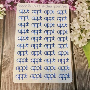 May include: A sheet of planner stickers with the word "appt" in a blue, handwritten font repeated multiple times. The text "appt- Empire sticker planner" is at the top. The stickers are on a white background.