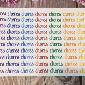 May include: A sheet of colorful stickers with the word "chores" repeated in a rainbow pattern. The stickers are in a cursive font and are arranged in neat rows and columns.