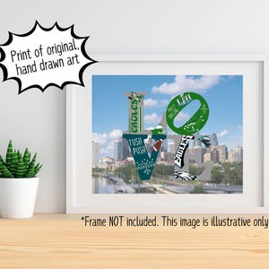 May include: A green, white, and black print of the word "LOVE" made up of Philadelphia Eagles logos and imagery. The print is set against a backdrop of a cityscape and a blue sky with white clouds.