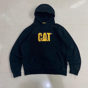 May include: Black hooded sweatshirt with a kangaroo pocket and the CAT logo in yellow. The sweatshirt has a drawstring hood and long sleeves. The CAT logo is centered on the chest.
